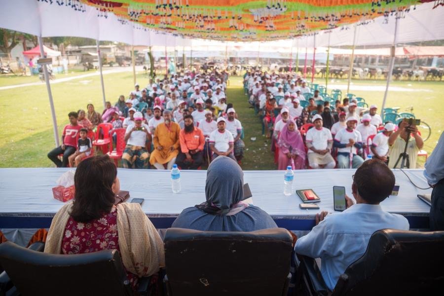 Farmers seated at an MVC camp event
